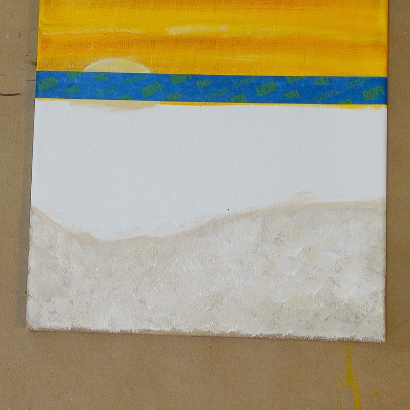 tape of sunset sky before painting ocean