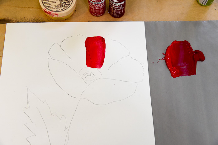 outline of red poppy painting