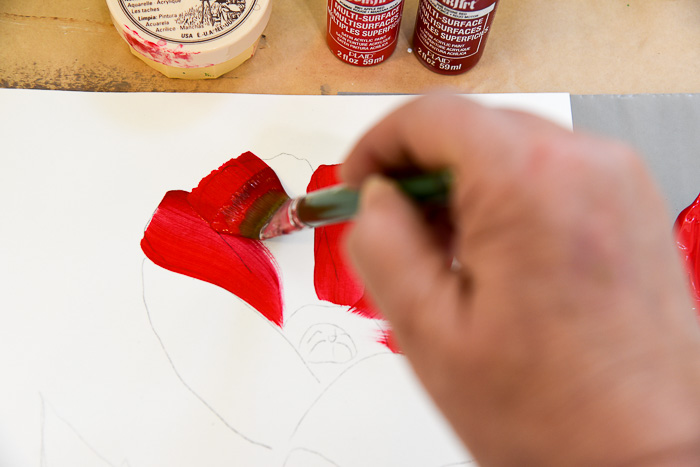 Strokes on how to paint a large red poppy