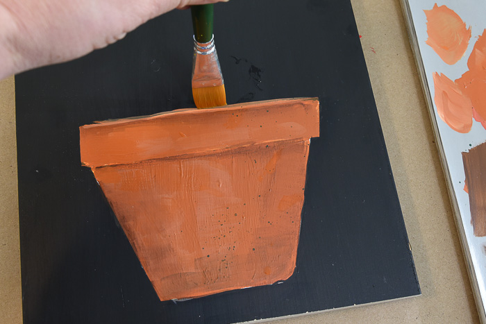 Paint a Terra Cotta Pot in acrylics. Painting clay pots is a great way to start a floral painting. I show you how step by step, with video and pattern