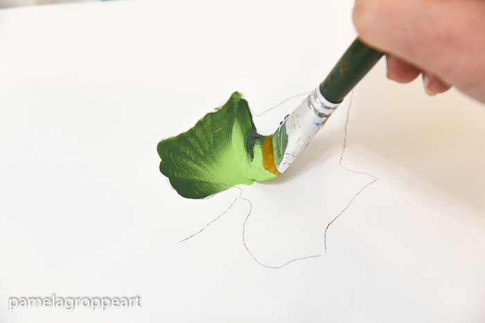 painting a pumpkin leaf in folk art acrylic paints