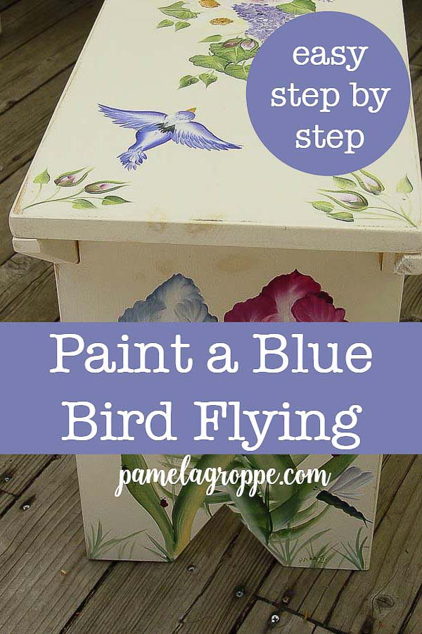 DIY bench painted with flowers and birds with text overlay, pamelagroppe.com