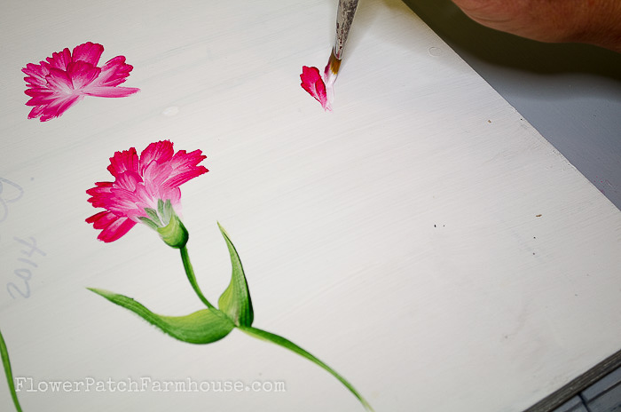 Beginning stroke of painting carnations in acrylics, pamela groppe art