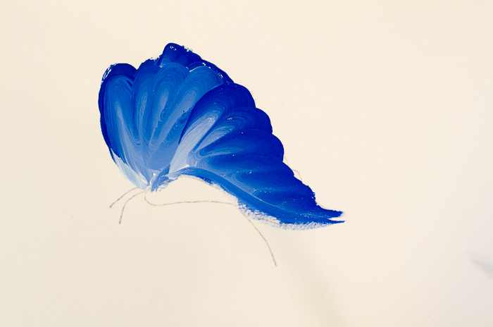 Beginning of a blue butterfly painted in acrylics, pamelagroppe.com