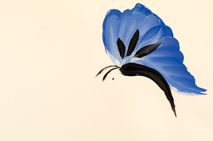 Adding antennae to blue painted butterfly, pamelagroppe.com
