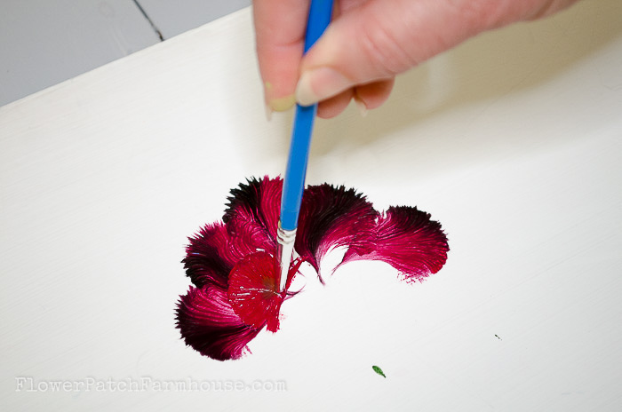 Second layer of petals painting a carnation with a round brush, pamelagroppe.com