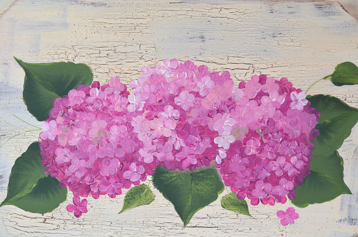 Painting of pink hydrangeas on board, petals all added