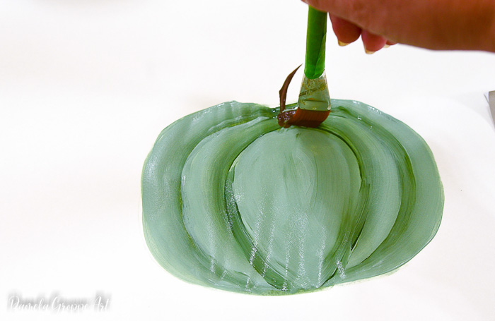 Painting the stem of the Green pumpkin