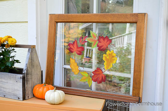 Fall Autumn leaves painted on a glass vintage window displayed with small pumpkins pamela groppe art