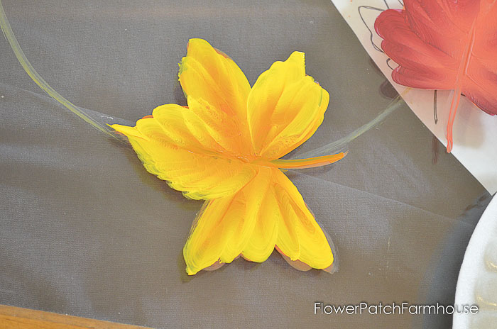 hand painting fall leaves on a vintage window, yellow leaf, pamela groppe art