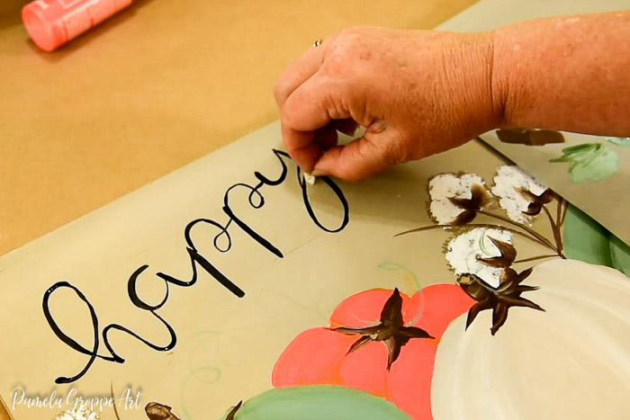 Fixing mistake on happy fall lettering for diy sign
