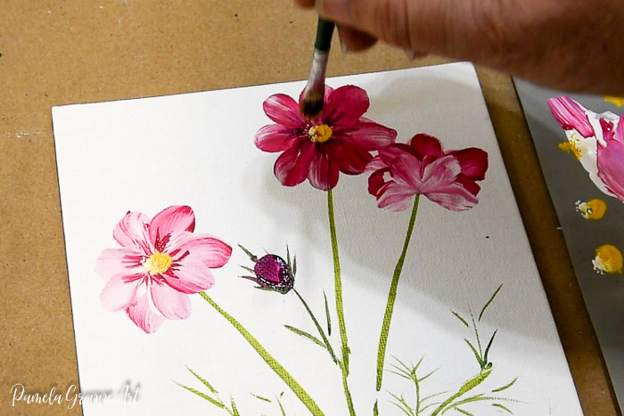 Tapping in the center painting cosmos flowers