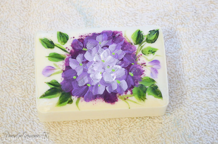 Purple flowers painted on soap, pamela groppe art