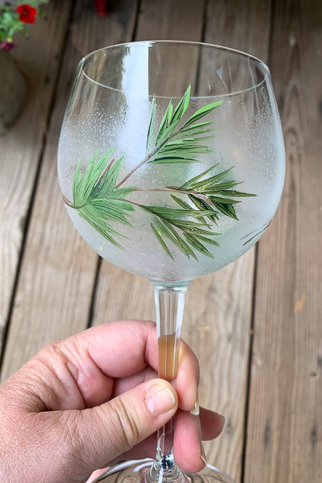 wine glass painting with a frost finish and pine bough, pamela groppe art