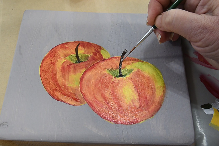 adding a stem to apple painting, pamela groppe art