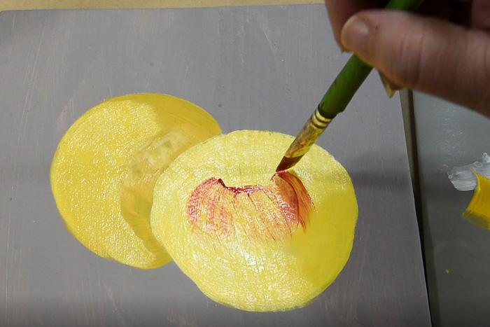 adding red to the apple under stem dimple