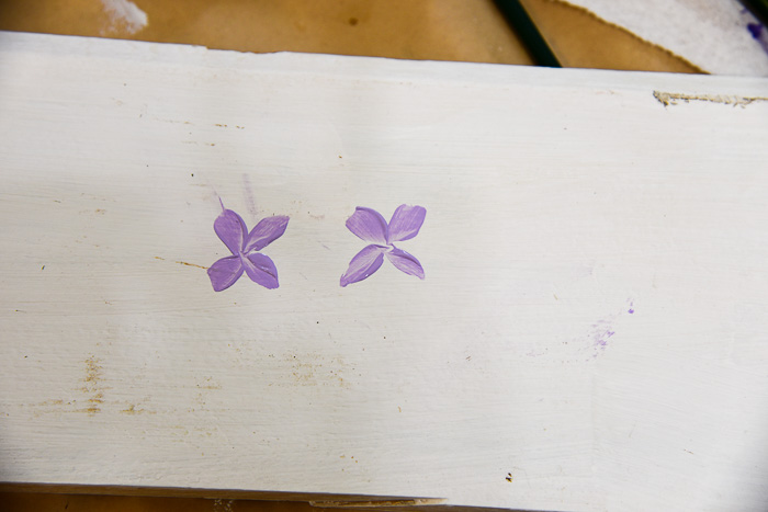 Paint petal strokes to begin violets