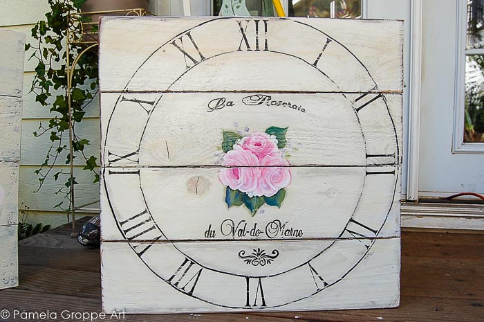 faux vintage clock painted on pallet wood board