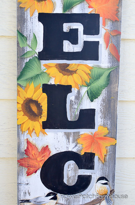 Paint fall leaves on DIY autumn inspired sign