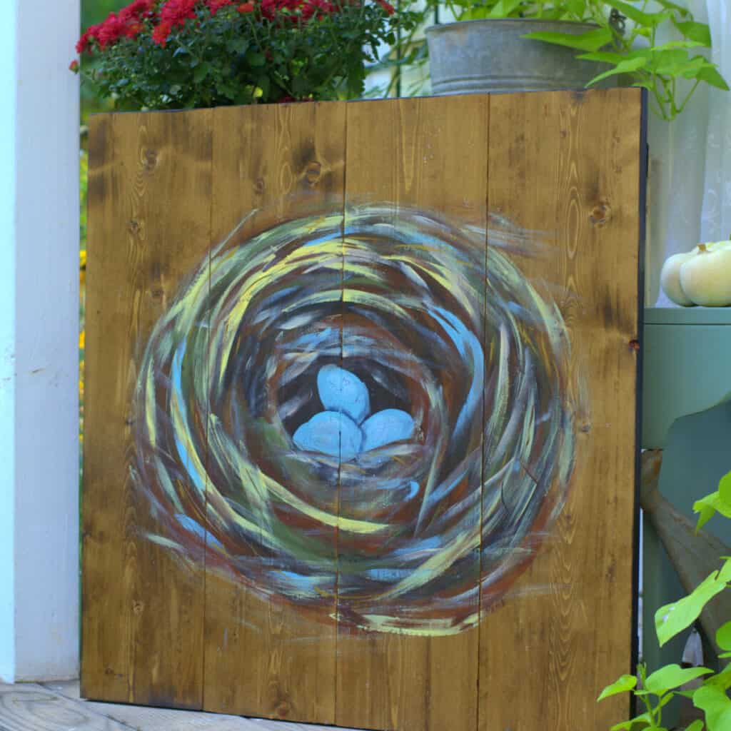 paint a birds nest on a wood pallet