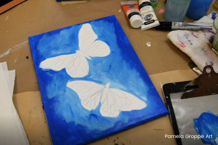 As you paint Cerulean blue add white towards center of canvas