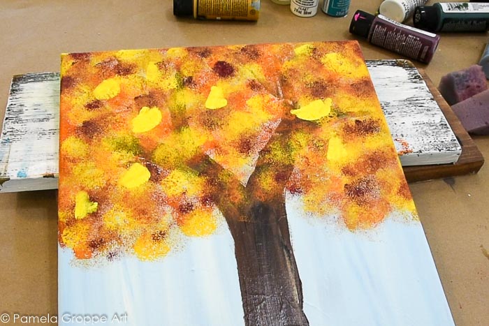 paint a fall tree with a paint brush