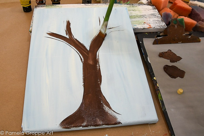 Painting tree trunk in with Burnt Umber and Bark Brown