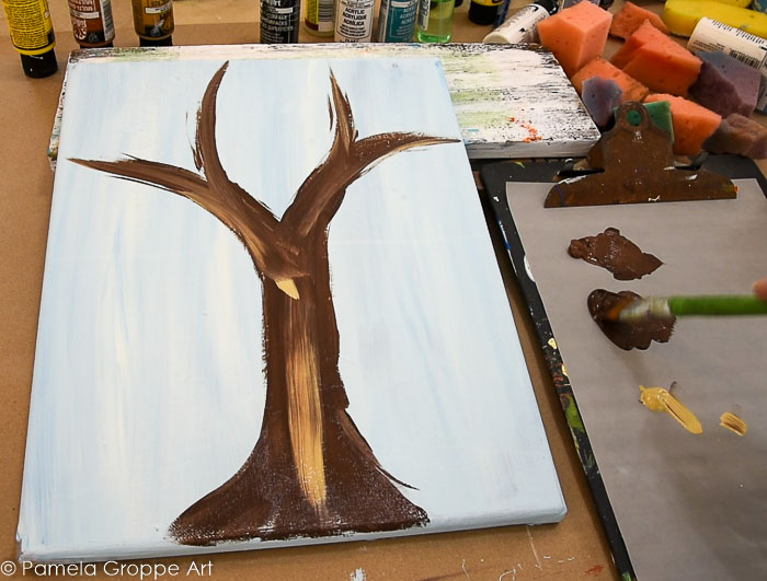 adding Camel, a tan color, streak in some highlights to the fall tree trunk
