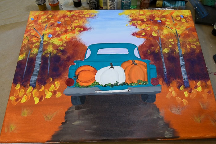 paint white pumpkin and add finishing touches to painting