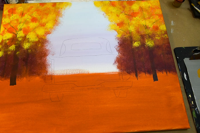 Add lighter yellows to trees in fall truck painting to brighten it up