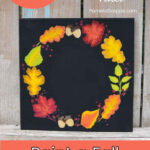 Fall Leaf wreath on black background painted in acrylics, text overlay Paint a Fall Leaf Wreath, easy, with video, PamelaGroppe.com