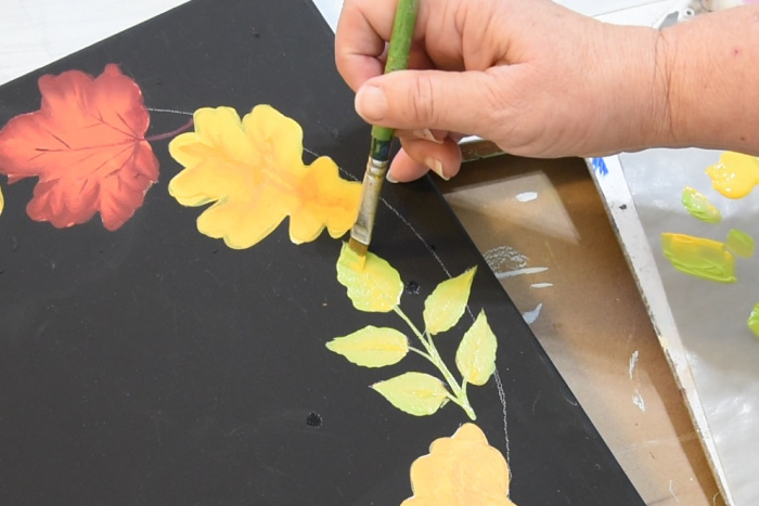 Paint leaf spray with citrus green and school bus yellow