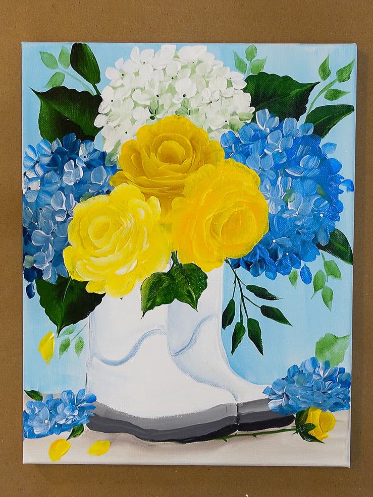 yellow roses and blue hydrangeas in rainboots painting