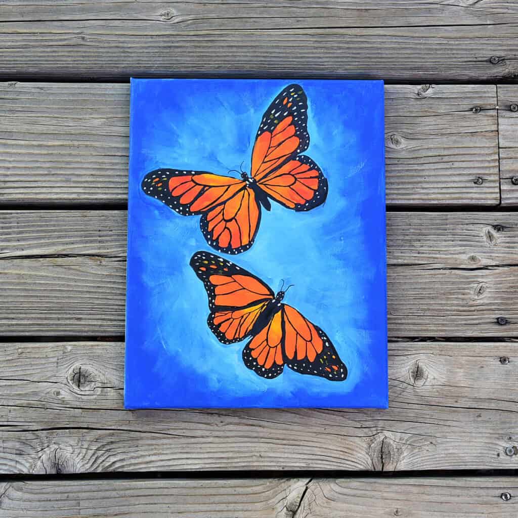 Paint a monarch butterfly