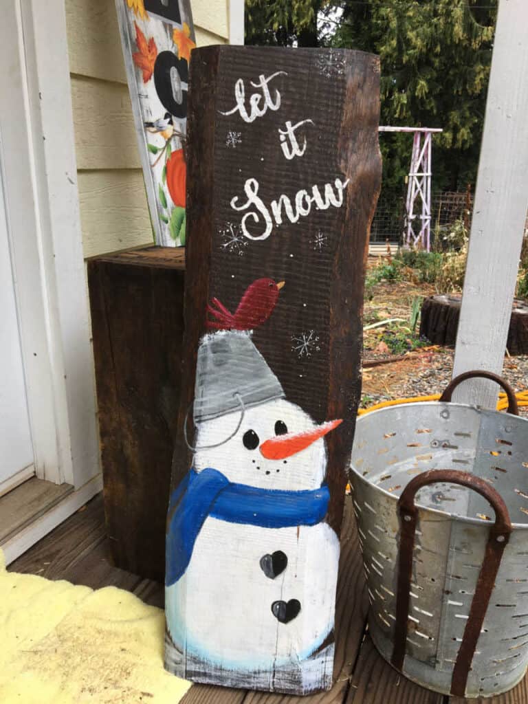 snowman sign painted in acrylics, let it snow