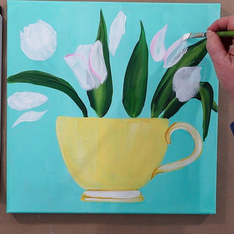 underpaint tulips with white, paint pink tulips in teacup