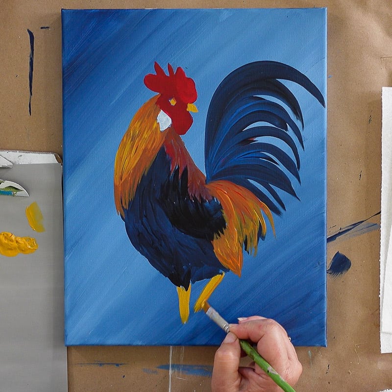 Paint golden feathers on Rooster, pamela groppe art