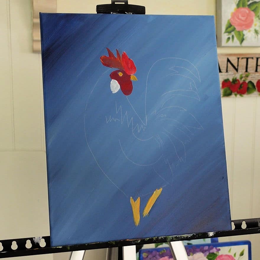 Paint rooster legs and beak with yellow ocher