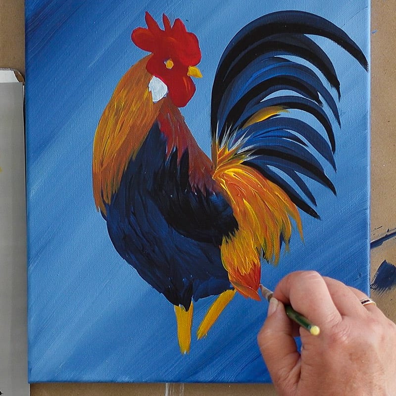 Adding some details to the rooster painting, Pamela Groppe Art