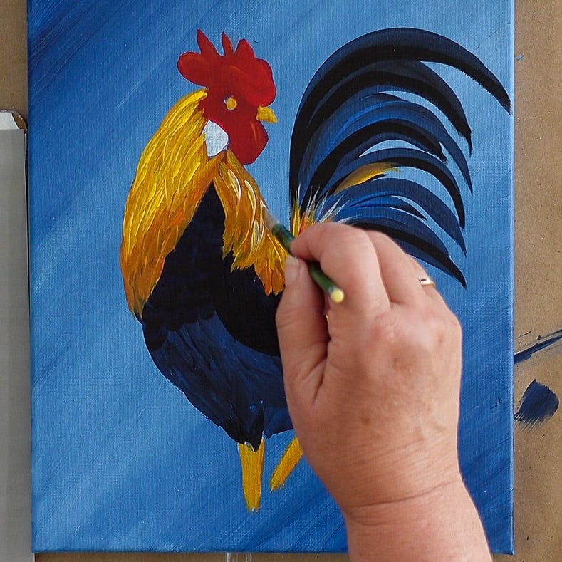 Add a touch of white to back neck feathers on Rooster painting