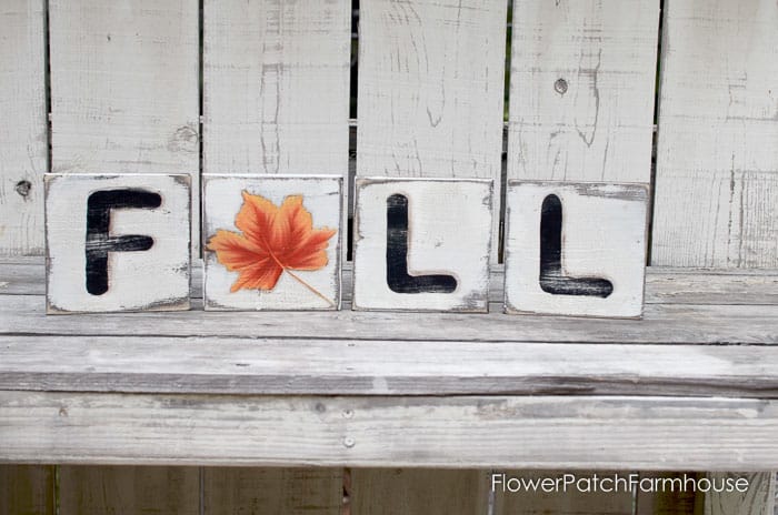 diy wood scrabble tiles painted with the letters F, then a Autumn leaf for the A, then L and L for FALL art or home decor