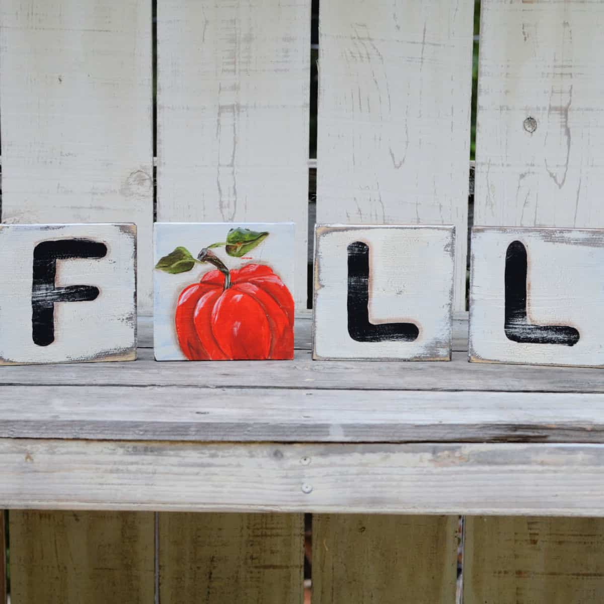 Fall Scrabble Art DIY, Scrabble tiles cut from lumber painted to spell FALL with a pumpkin in place of the A, Pamela Groppe Art