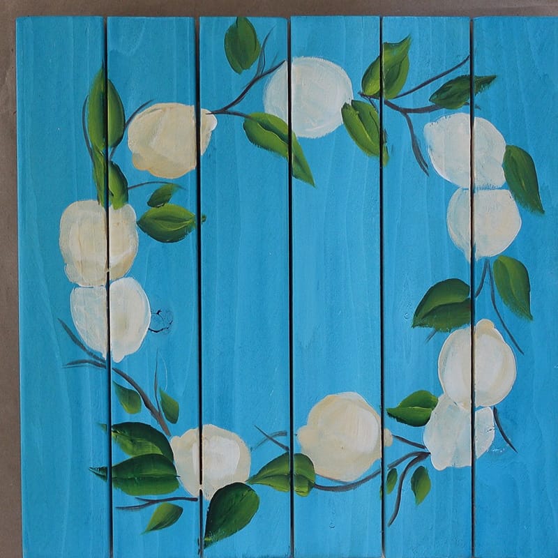 paint leaves and twigs on lemon wreath 