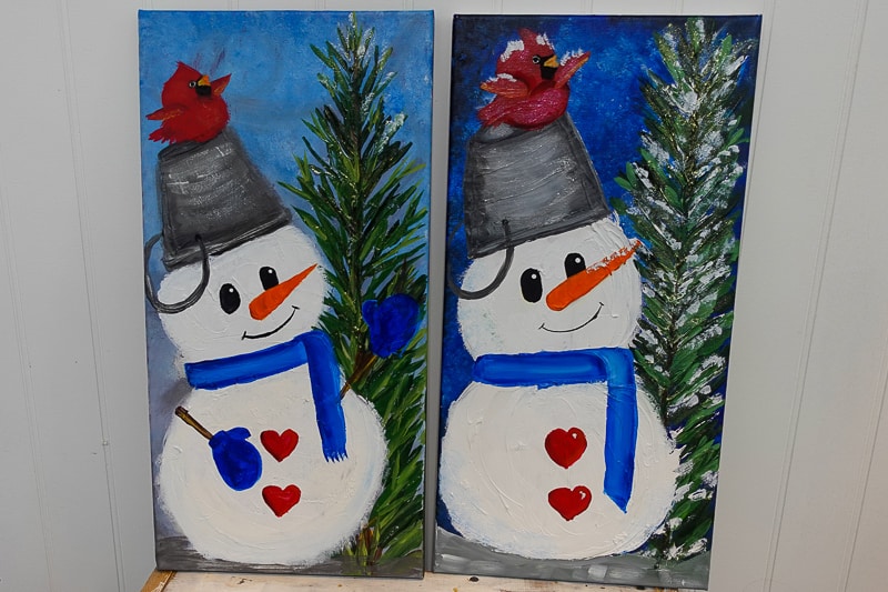 Snowman with cardinal paintings, 