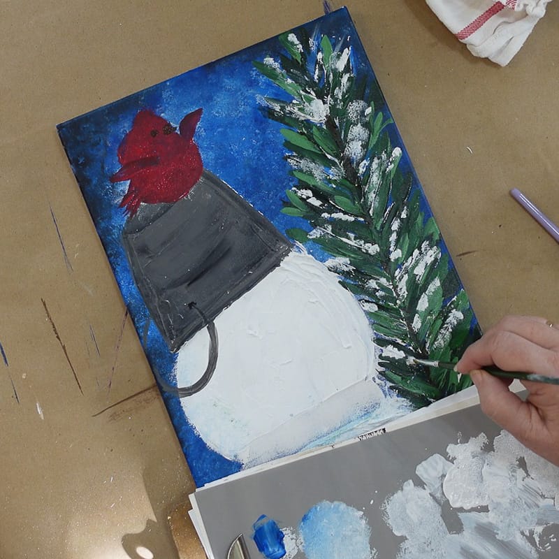 Add snow to tree for snowman and cardinal