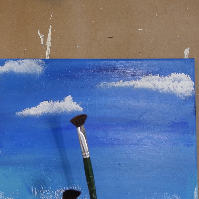 3/4' inch Donna Dewberry One stroke brush in front of cloud painting