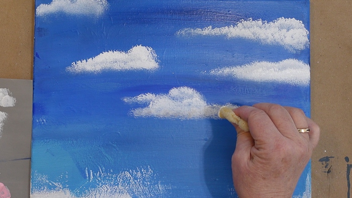 shading clouds with gray acrylic paint