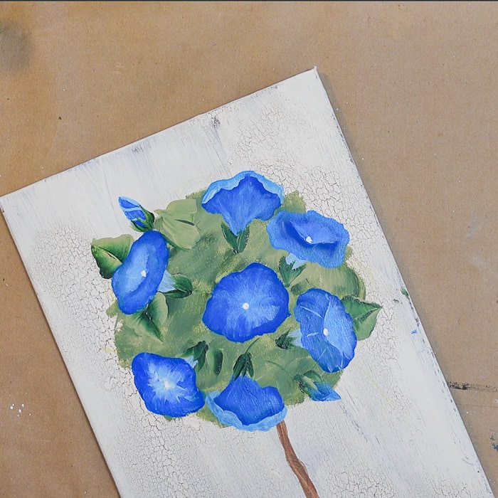 Paint leaves on topiary of morning glories