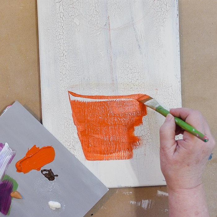 painting a terra cotta pot for morning glory topiary