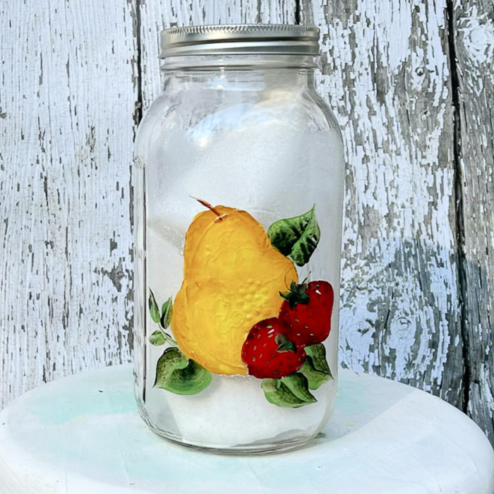 half gallon mason jar painted with a pear and strawberries